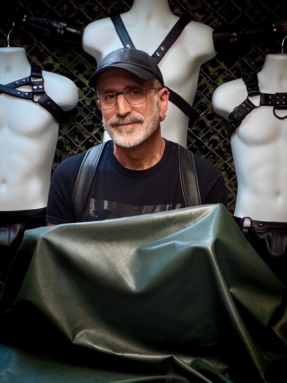 Cuir Gear maker portrait with mannequins and green leather
